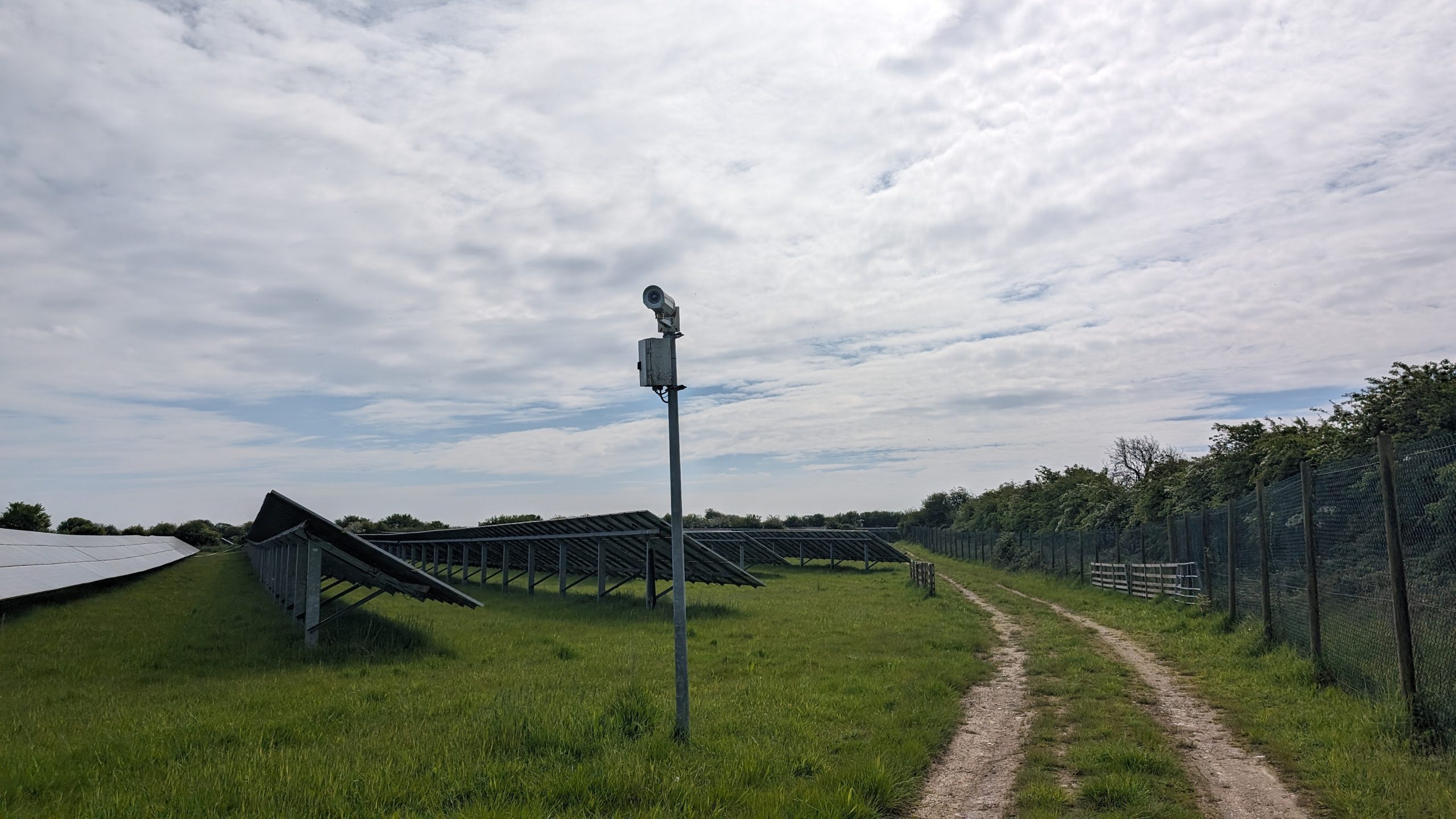 Ground-mount solar system undergoing a PM inspection