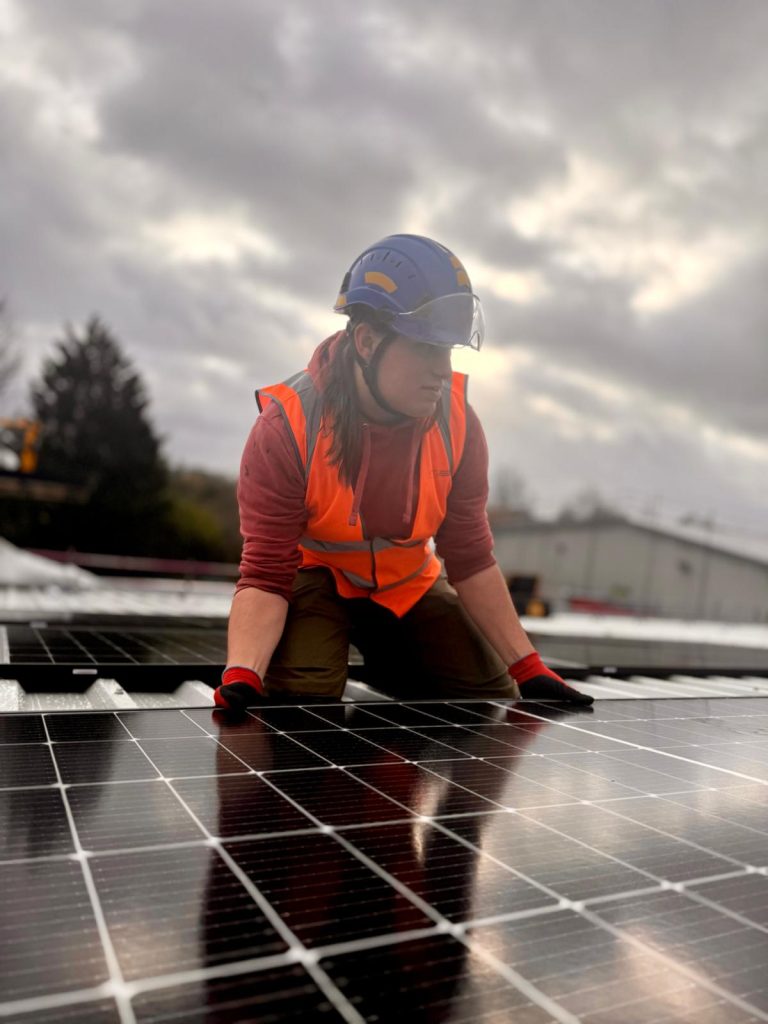 Engineer inspecting PV performance