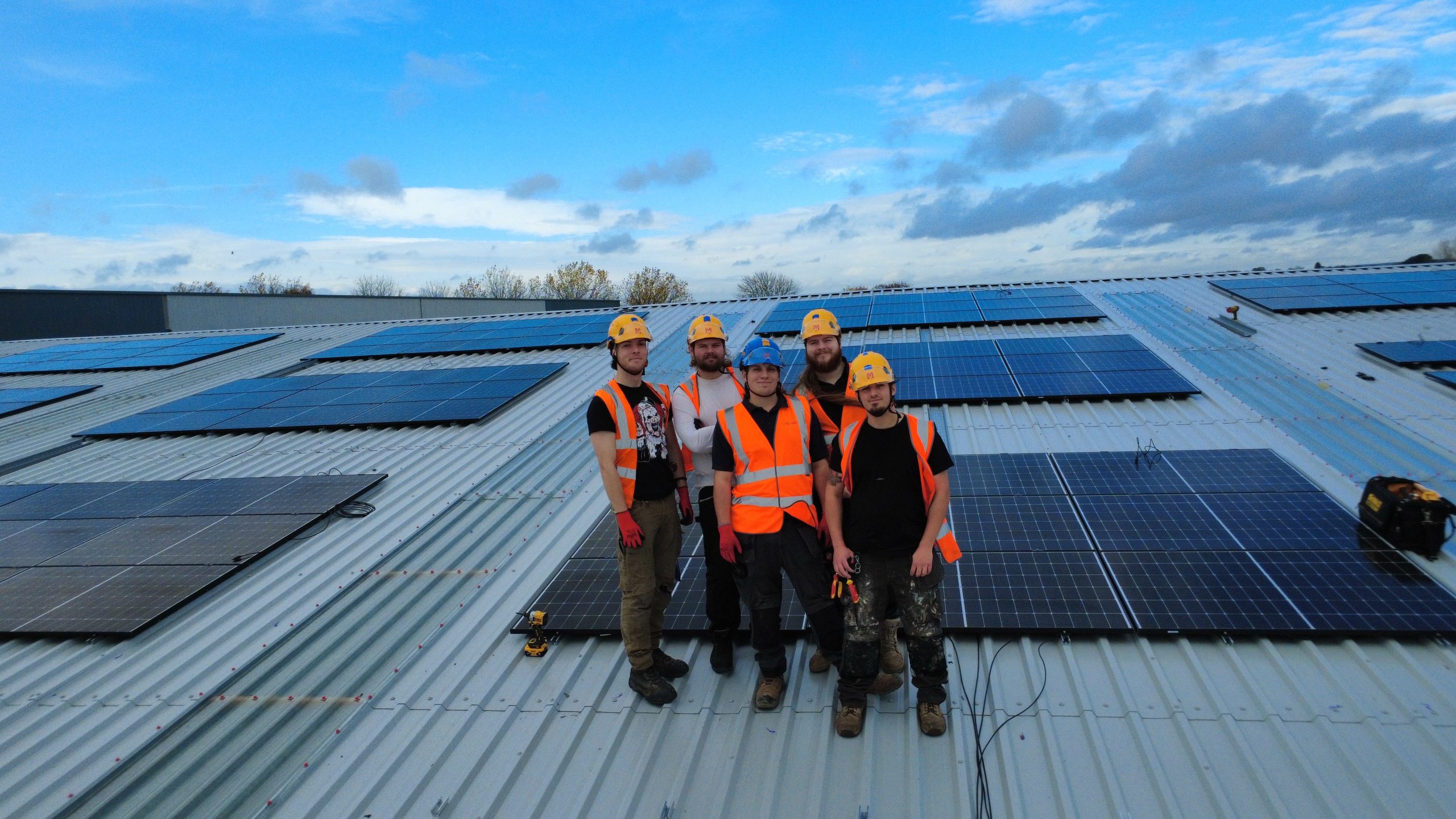 Bailey Renewable Team on rooftop install